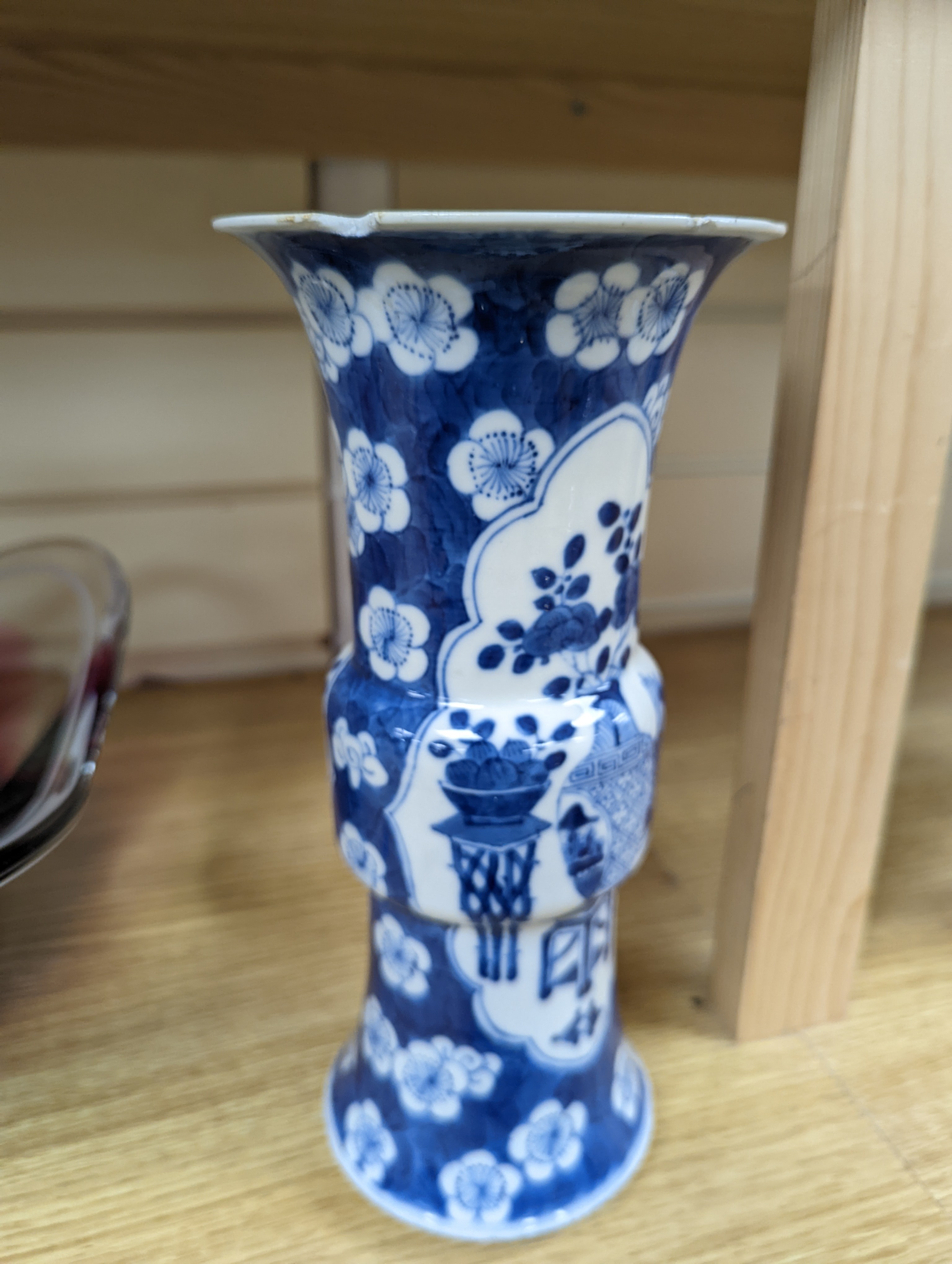 A 19th century Chinese blue and white prunus gu vase, 25 cms high.
